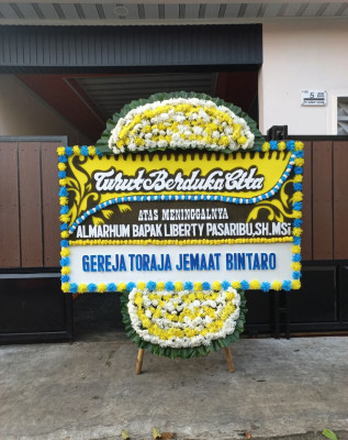 Papan Bunga Duka di Sasak